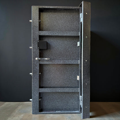 back of vault door with black background