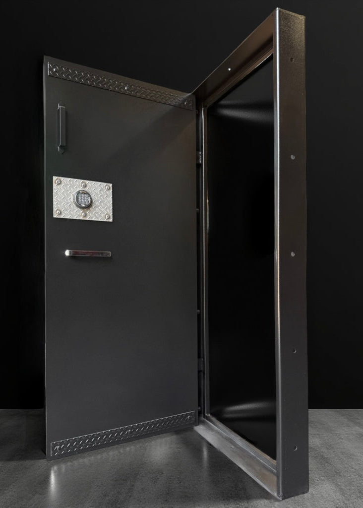 Black metal diamond plate vault door on a dark background