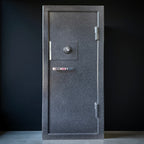 front of gun safe with a silver handle on a black background.