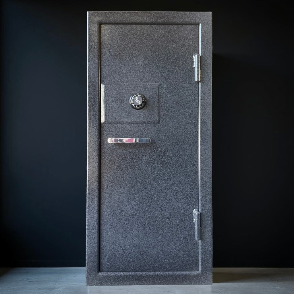 front of gun safe with a silver handle on a black background.