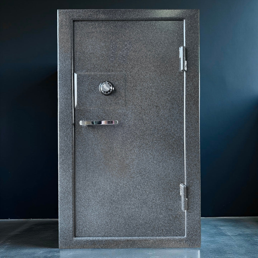 Gray gun safe with a silver handle on a dark background