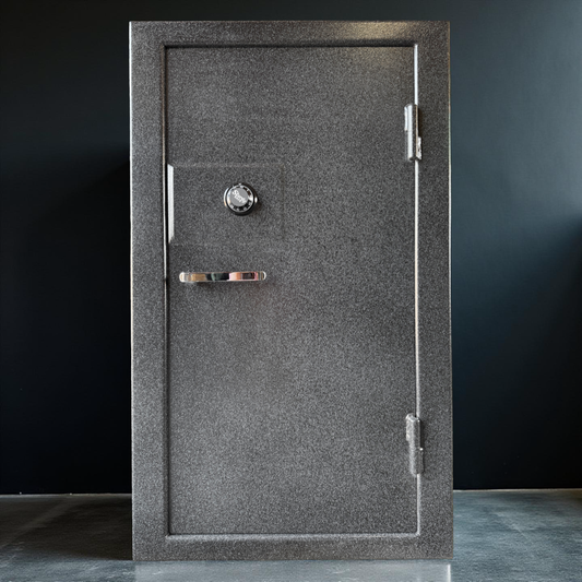 front view of gun safe against black wall