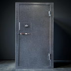 Gray gun safe with a metallic handle on a black background