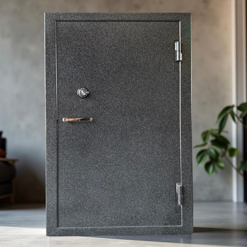 Gray gun safe with a handle and lock in a room setting