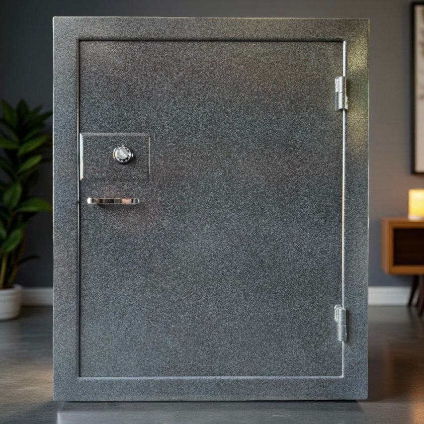 gun safe door in a room with a plant and furniture.