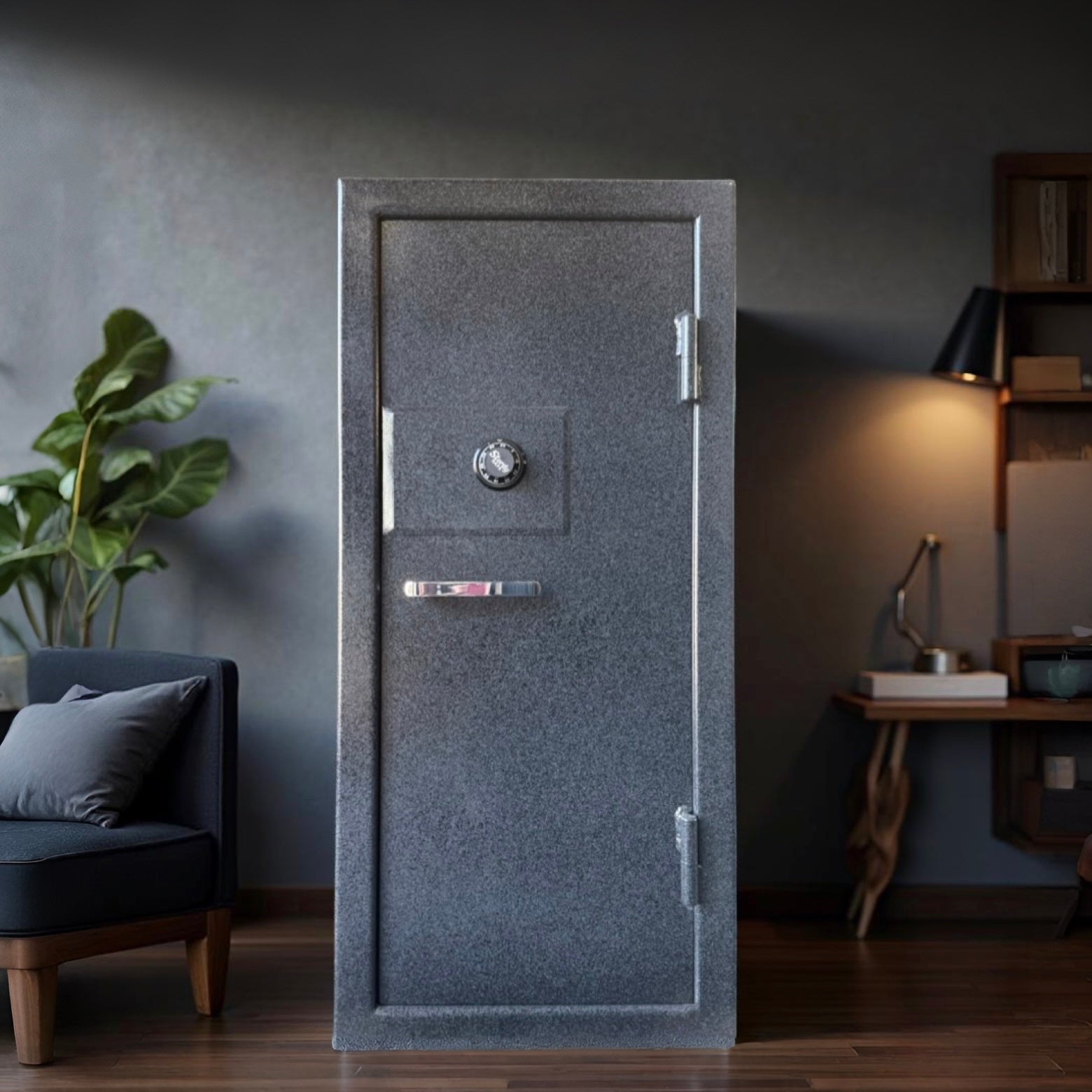 Large gray gun safe in a room with a plant and furniture.
