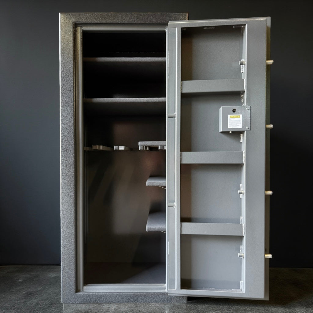 Open gray gun safe with shelves on a dark background