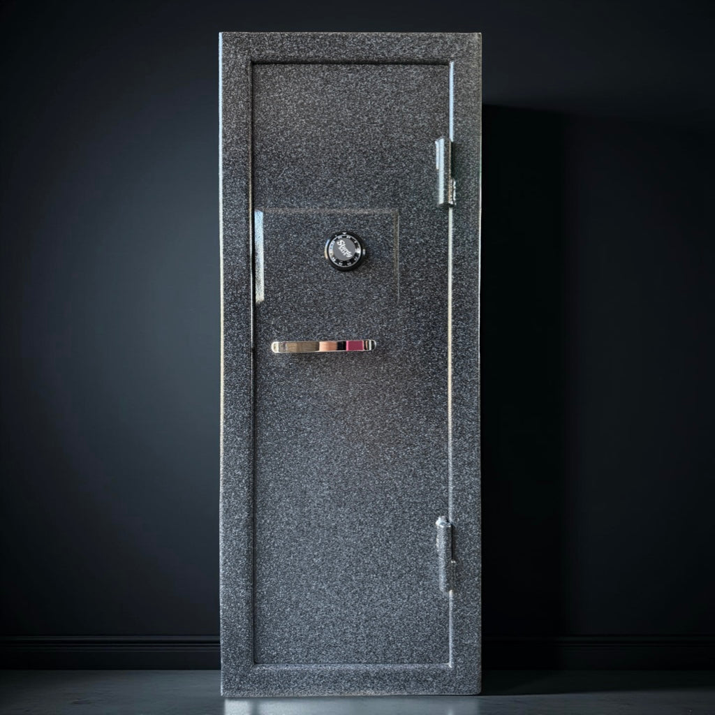 gun safe door with a lock on a dark background