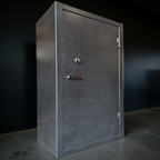 side view of gun safe against black wall