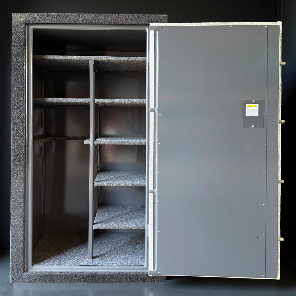 Large metal gun safe with open door revealing shelves inside on a black background