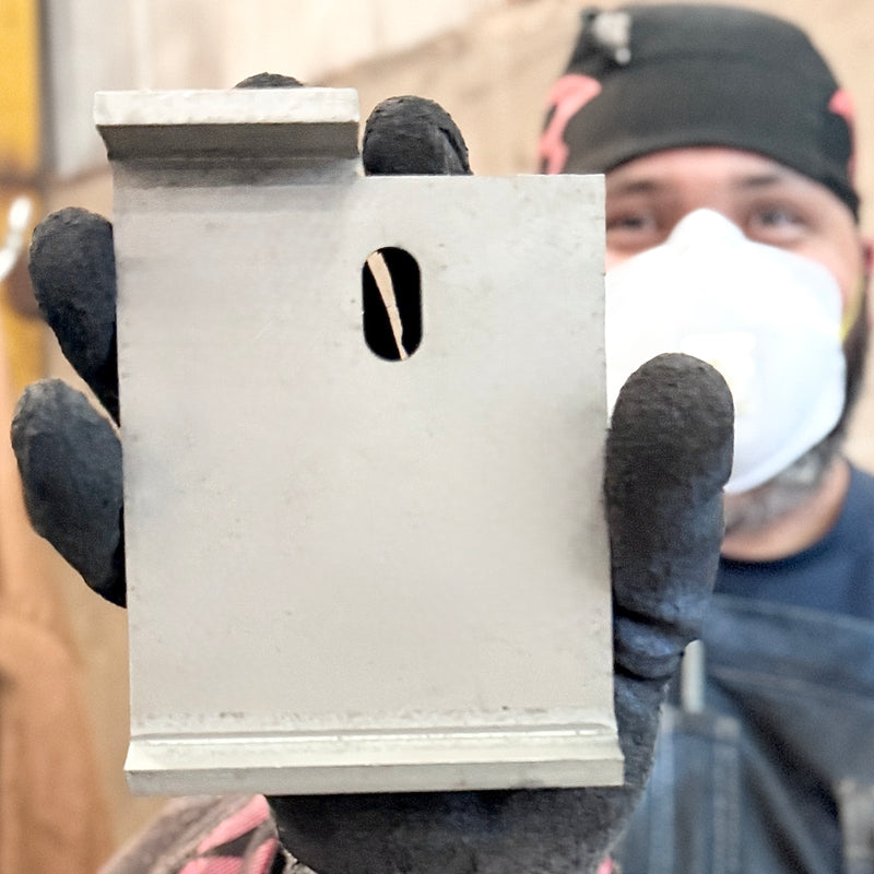person holding a gun safe hard plate
