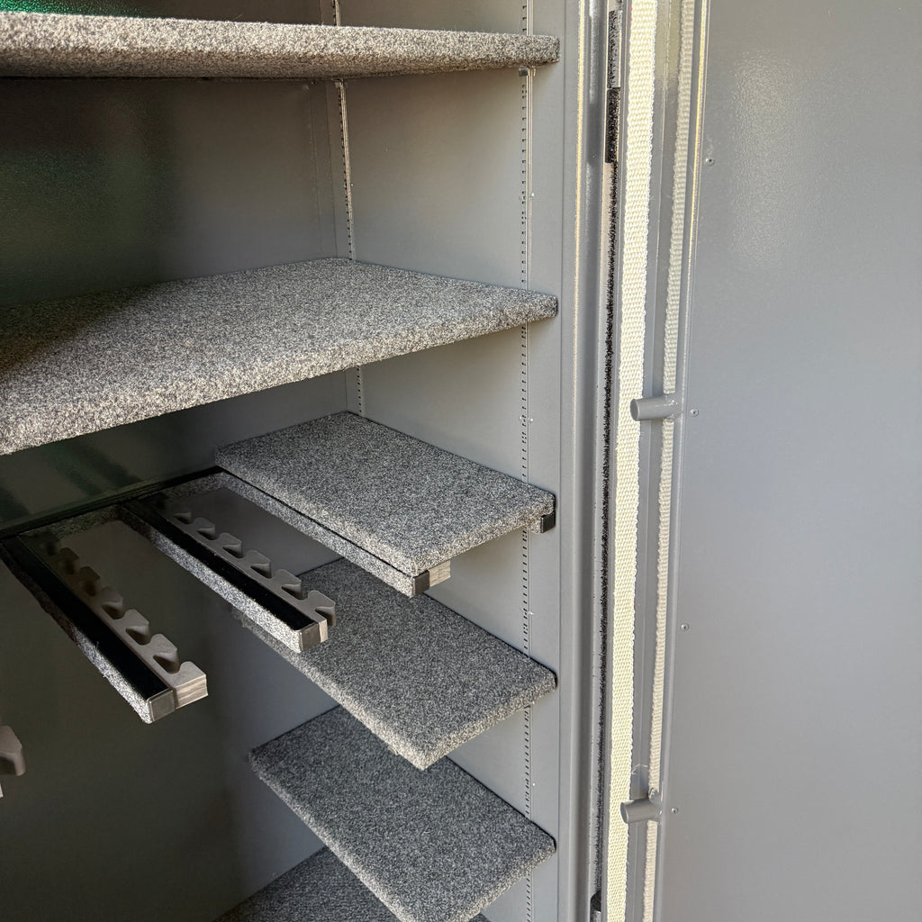 gun safe interior with gray shelves 