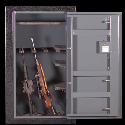 Opened sturdy Gun safe with rifles inside 